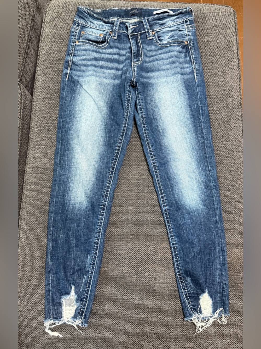 Daytrip Women’s Blue Washed Ankle Skinny Jeans with Distressed Ankles